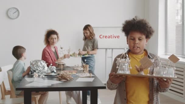 Medium Shot Curly Mixed Race Boy Standing Foreground Teacher Students — 图库视频影像