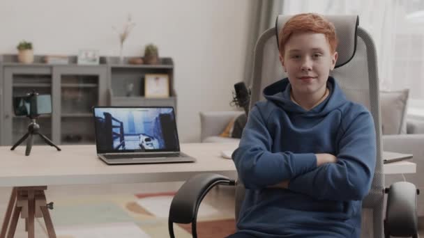Medium Pov Ginger Haired Caucasian Boy Sitting Chair His Room — Stock Video