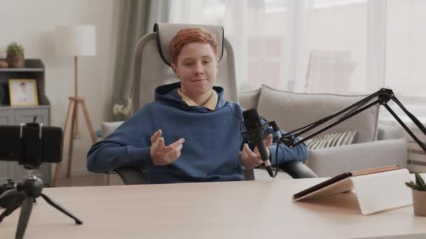 Waist Red Haired Caucasian Boy Dressed Casually Sitting Chair Desk — 图库视频影像