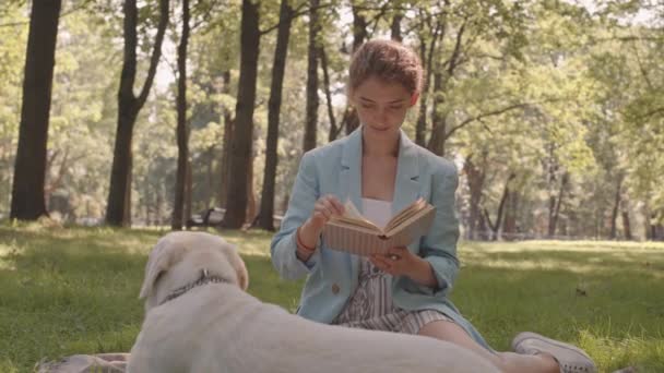 Medium Long Peaceful Caucasian Woman Reading Book Forest Sitting Lawn — Stok Video