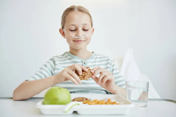 Smiling Girl Eating Lunch in Hospital Room — Stock Photo, Image