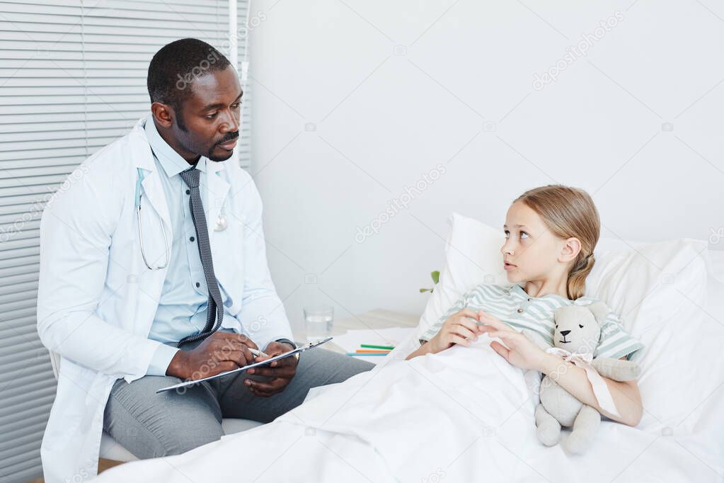 Doctor Talking to Child in Hospital