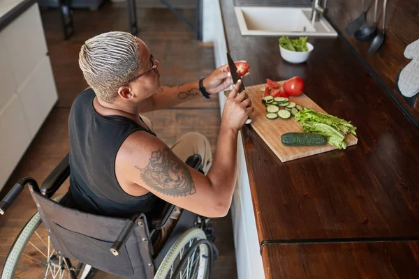 Modern Woman in Wheelchair Cooking — Stock Fotó