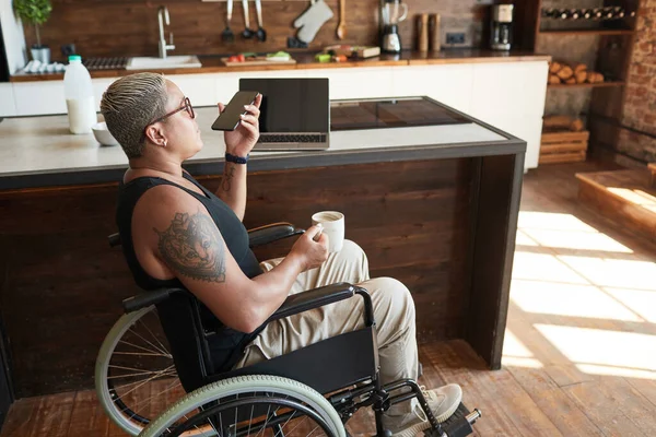 Modern Woman with Disability Using Smartphone — Stock Fotó