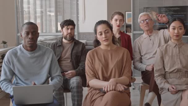 Medium Long Multiethnic Business People Sitting Chairs Listening Looking Camera — Stock Video