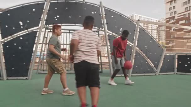 Tracking Slowmo Shot Sportive African American Man Playing Basketball Outdoors — Stock Video