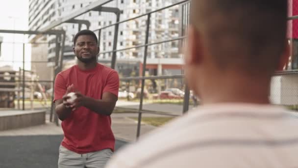 Shoulder Medium Shot Young Smiling African American Man Throwing Baseball — Stock Video