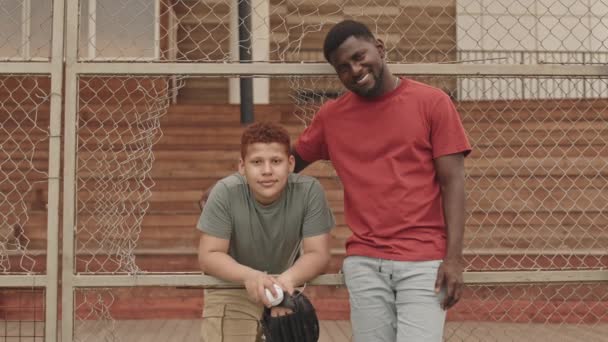 Medium Portrait Cheerful African American Man His Teenage Red Haired — Stock Video
