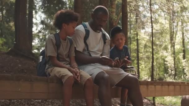 Medium Shot African American Man His Two Little Sons Sitting — Stock Video