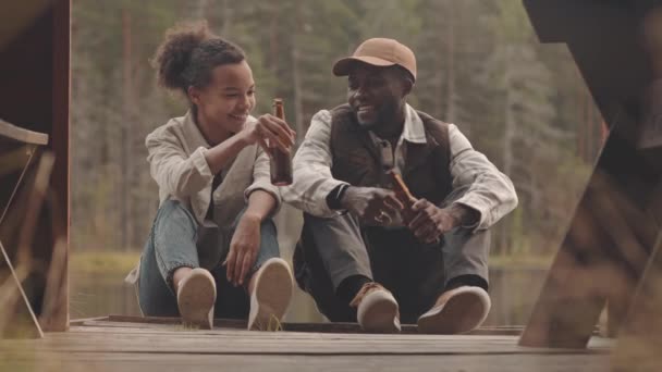 Slowmo Shot Young African American Couple Sitting Wooden Pier Lake — Stock Video