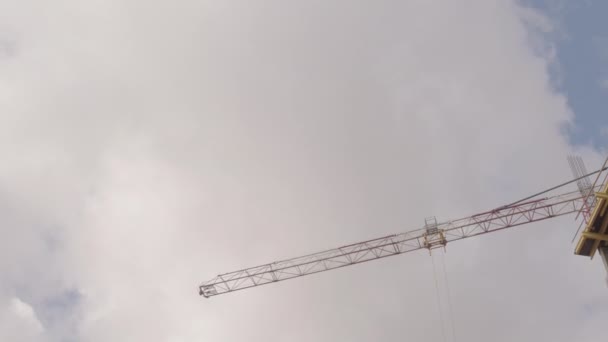 Low Angle Tracking Right Construction Site Multistory Building Construction Crane — Stock Video