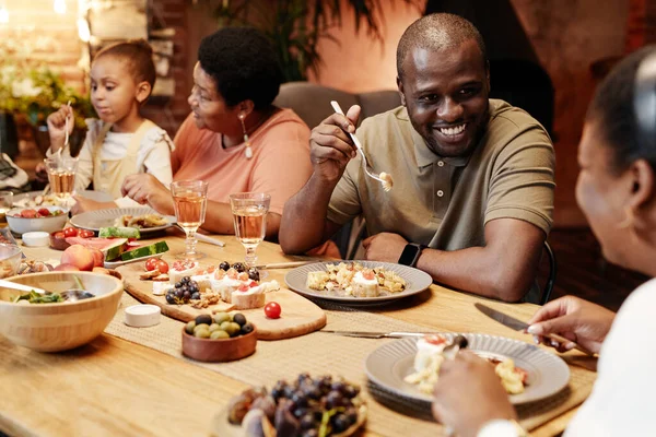 Smiling African American Man at Family Dinner — Stock Photo, Image