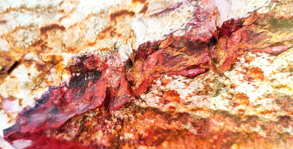 Colorful background from natural stone. Creative bright colors of nature