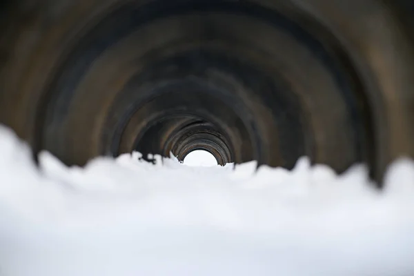 Texture of car tires. The tunnel of tires in the snow. The concept of security of the car: winter tires, fifth wheel ice. Selective focus — Stock Image Texture Car Tires Tunnel Tires Snow Concept Security Car Winter Royalty Free Stock Images