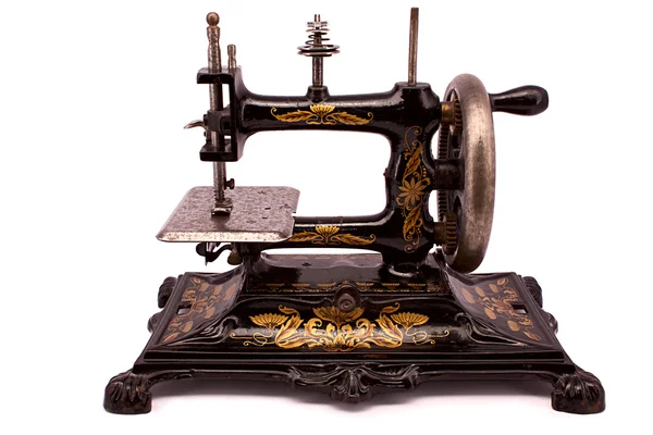 Antique sewing machine on white background — 图库照片