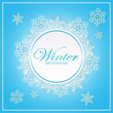 Kar taneleriyle kışın mavi arka plan