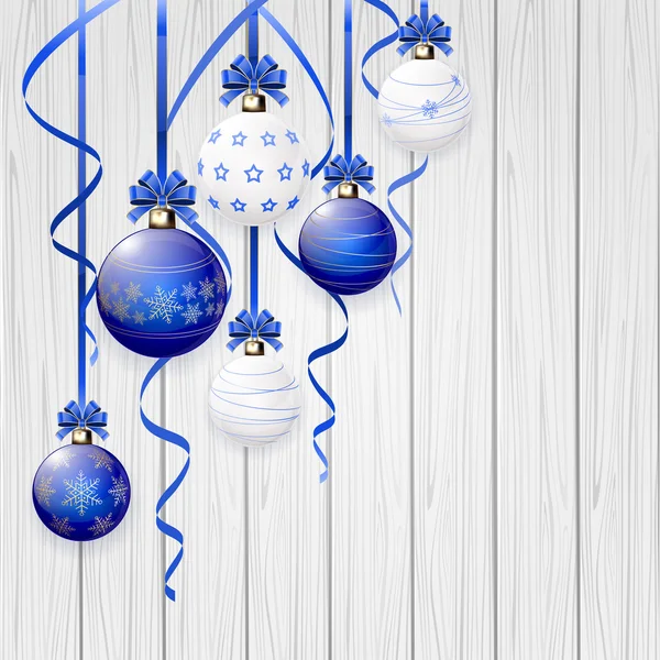 Blue Christmas balls en klatergoud op houten achtergrond — Stockvector