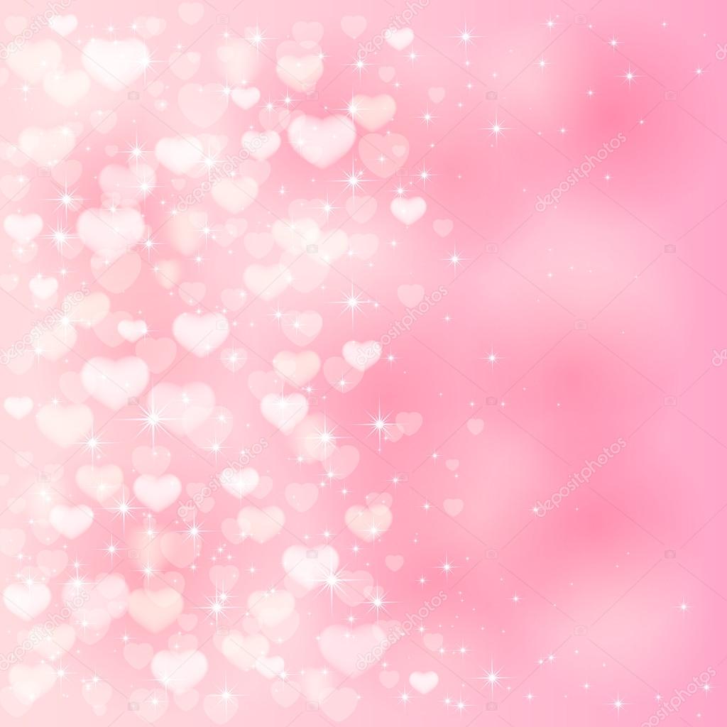 Blurry hearts on pink background