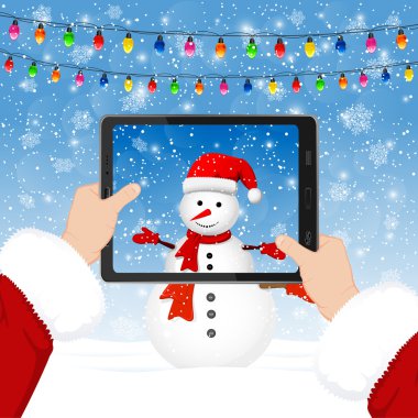 Santa kardan adam fotoğraflarını çeker
