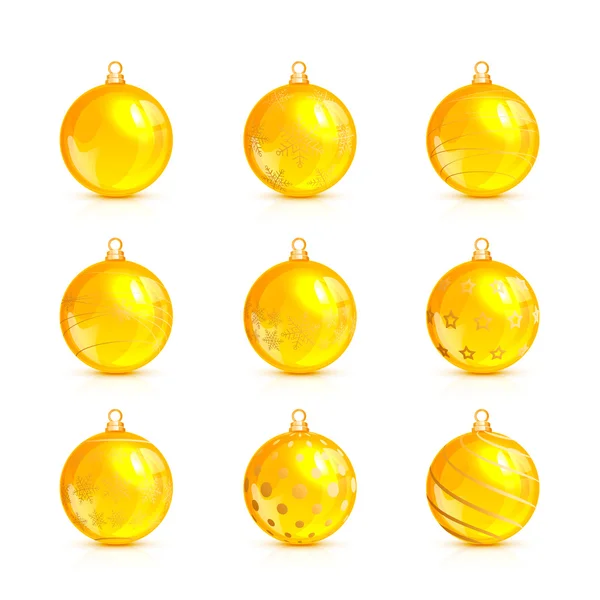 Aantal gele kerstballen met gouden patroon — Stockvector