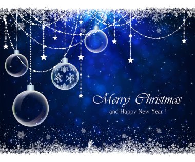 kar taneleri ve Noel topları ile mavi arka plan