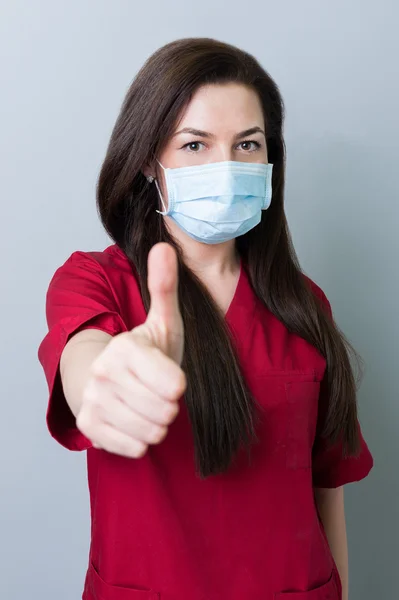 Dentist woman showing thumbup — Stock Photo, Image