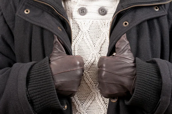 Man in winter clothes holding his jacket in close-up picture — Stock Photo, Image