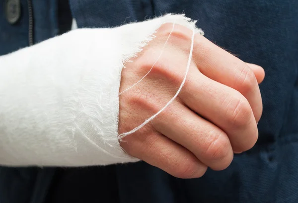 Closeup hand and fingers with white bandage — Stock Photo, Image