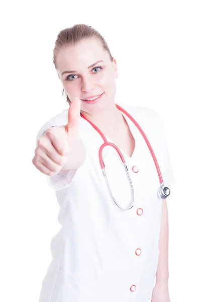 Attractive young female doctor showing thumbs up — Stock Photo, Image