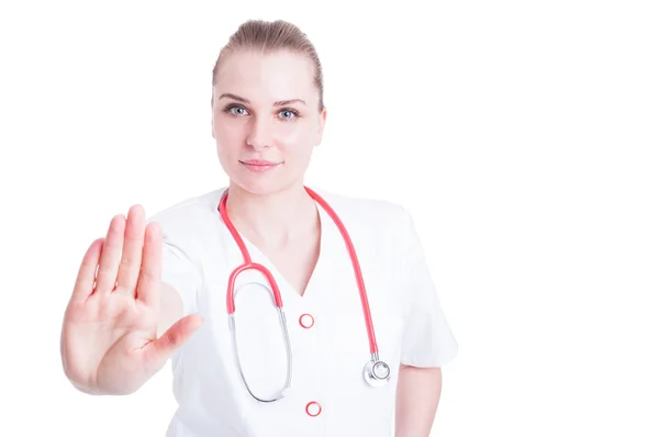Piękna kobieta lekarz z stetoskop robi gest zatrzymania — Zdjęcie stockowe