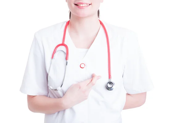 Smiling beautiful doctor crossed her finger for luck — Stock Photo, Image