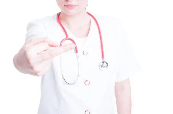 Młoda kobieta lekarz geście, rude — Zdjęcie stockowe