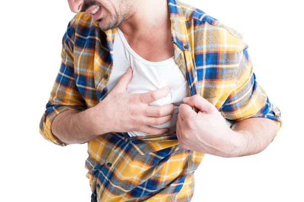 Stressed young man suffering from chest pain — Stock Photo, Image