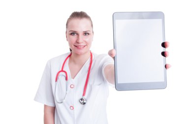 Woman doctor or medic showing blank screen wireless tablet