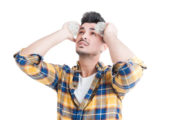 Portrait of young male model holding bottles of cold water — Stock Photo, Image