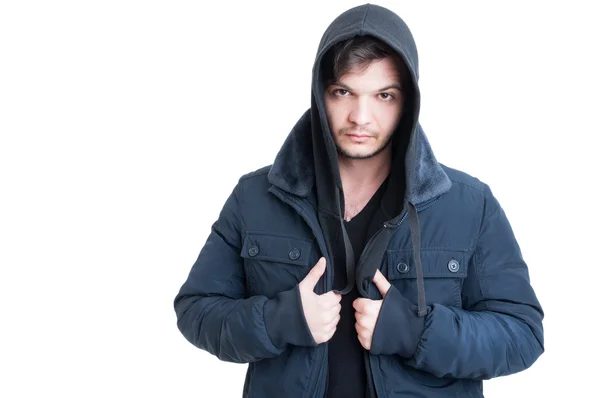 Portrait of young man wearing black hooded sweatshirt and jacket — Stock Photo, Image