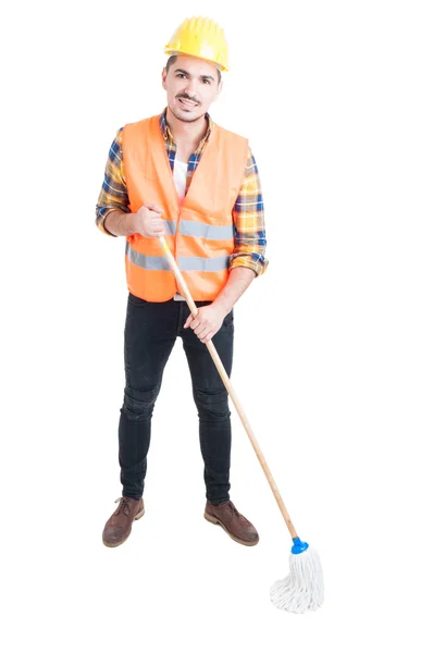 Young constructor with mop being ready to clean the floor — Stock Photo, Image