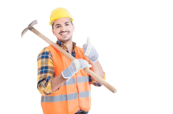 Handsome engineer showing thumb up or like gesture holding shove — Stock Photo, Image