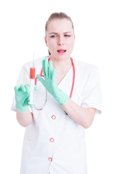 Female doctor make a refusal gesture for vaccination — Stock Photo, Image