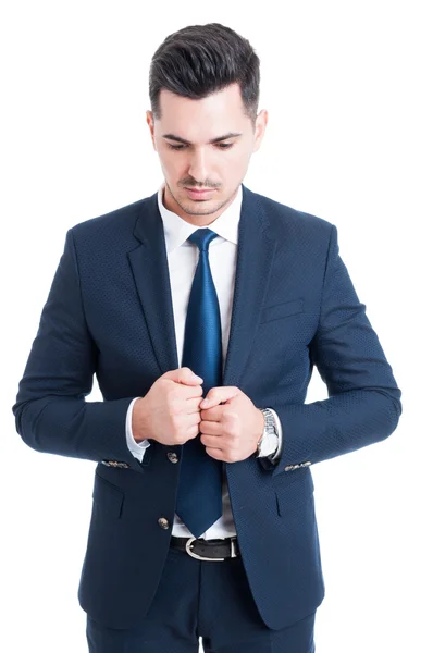 Pensive business man wearing elegant blue suit and tie — Stock Photo, Image