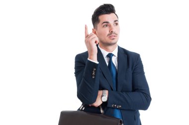 Young handsome and smart businessman having a great idea