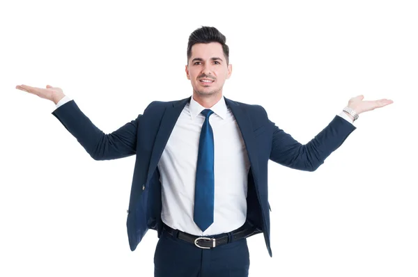 Businessman holding palms up as scale or balance — Stock Photo, Image