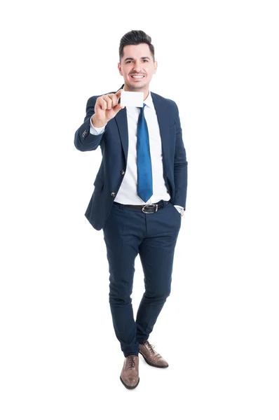 Full body of cheerful young businessman showing blank business c — Stock Photo, Image