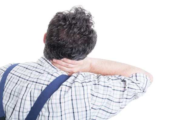 Tired mechanic suffering from neck pain in close-up — Stock Photo, Image