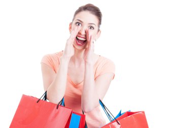 Young lady shopper shouting or yelling sales concept 