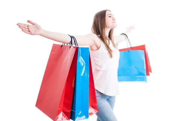 Freedom concept with beautiful shopaholic standing with arms wid — Stock Photo, Image