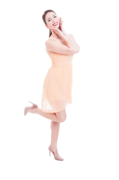 Young lady posing as being pretty in dress and heels — Stock Photo, Image