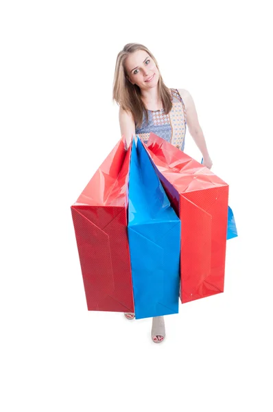 Smiling female buyer with shopping bags looking happy — Stock Photo, Image