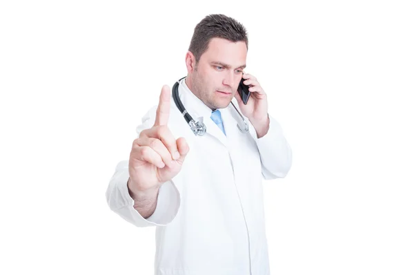 Male doctor or medic showing index finger like hold gesture — Stock Photo, Image