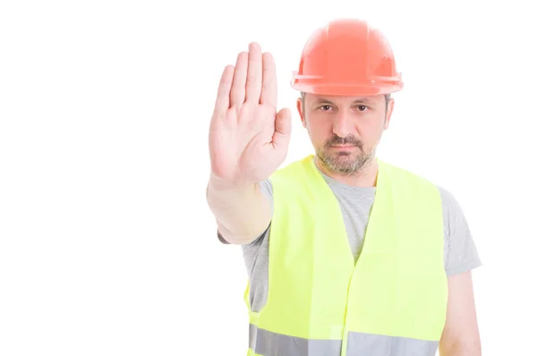 Constructor en equipo de protección haciendo stop gesture — Foto de Stock